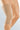 An image of a 7-Caramel-No-Topband-20-30-mmHg Medi Elastic Compression Knee Sleeve | Compression Apparel